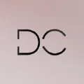 Dominique Cosmetics logo