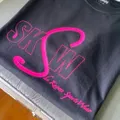 She Knows SportsWear logo