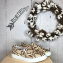 Rusted Arrow Boutique logo